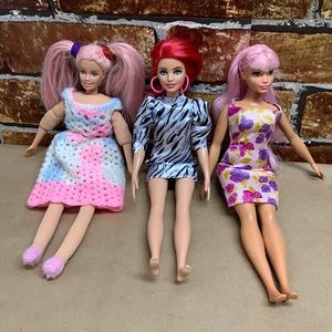 Three barbie Mattel dolls